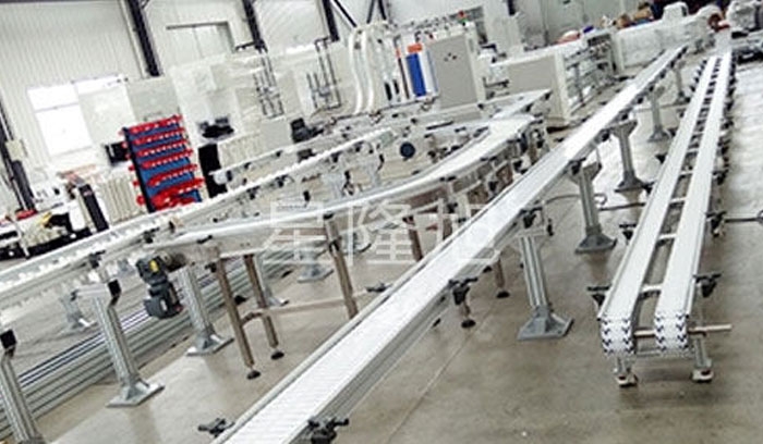 Flexible chain plate conveyor line processing